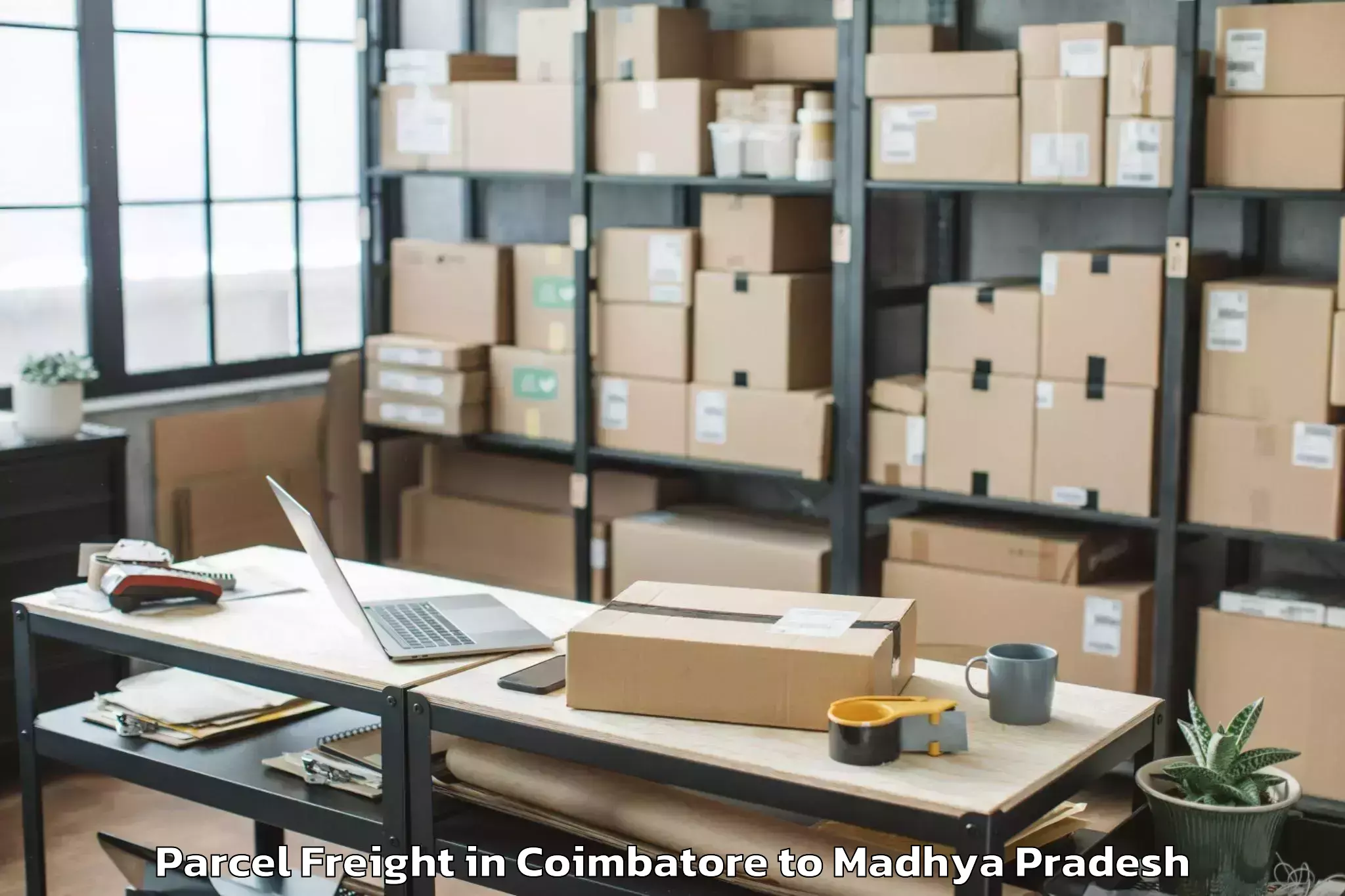 Book Your Coimbatore to Porsa Parcel Freight Today